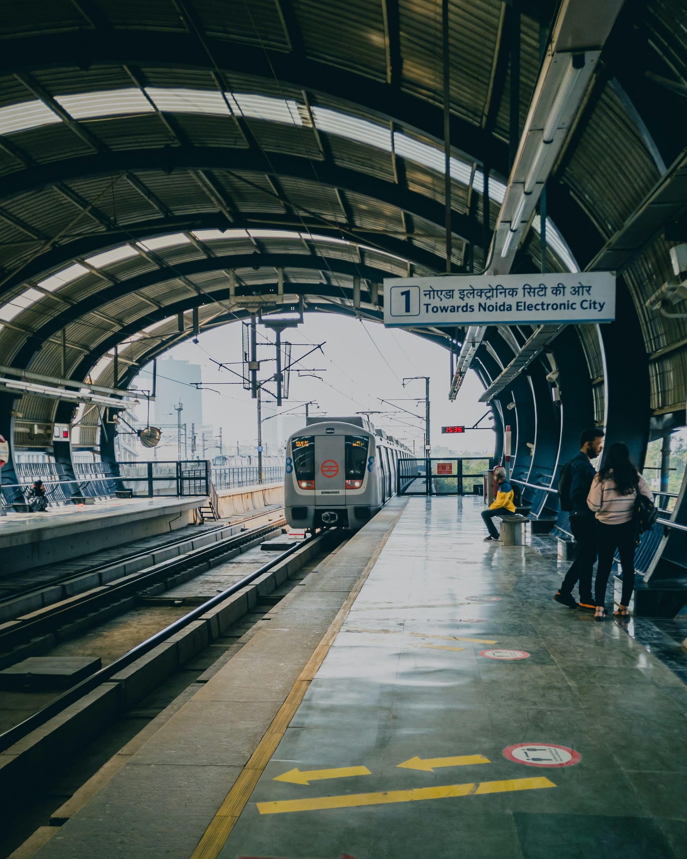 A metro train at a station platform in Noida